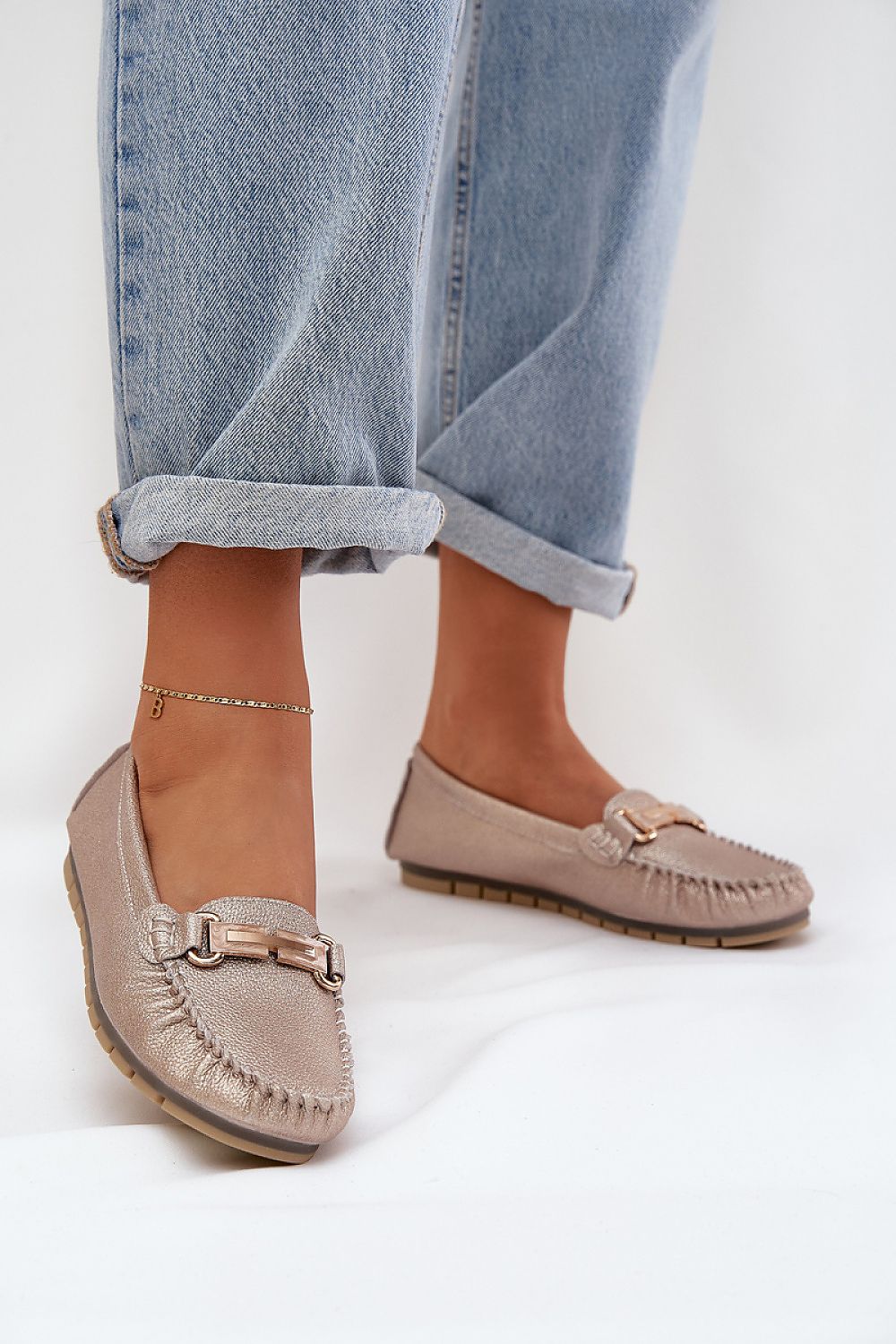 Elegant women's moccasins made of natural leather with sequins from Step in style, showcasing a luxurious design perfect for everyday comfort in sizes EU 36-41.