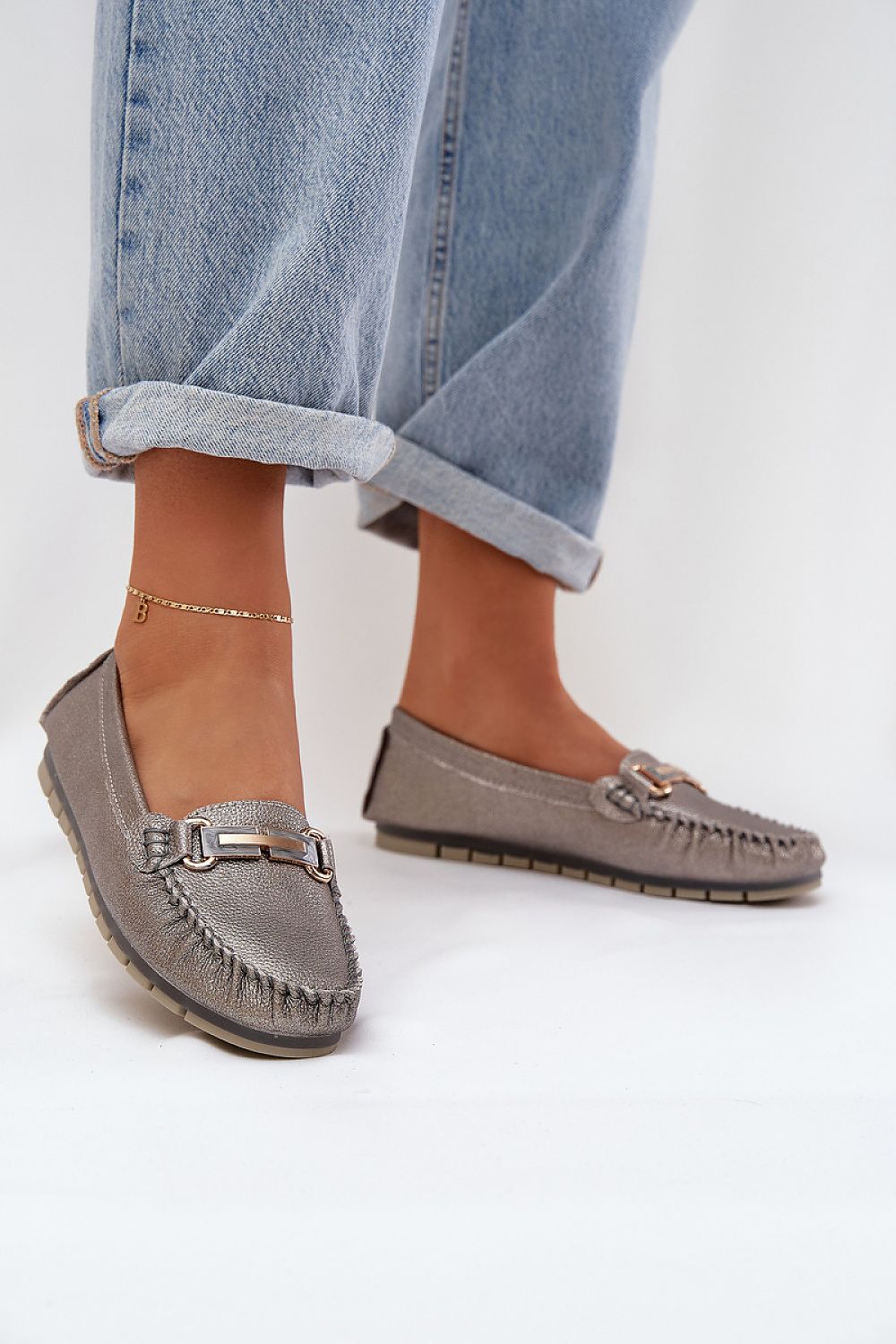 Stylish natural leather moccasins for women, adorned with sequins, offered by Step in Style for fashionable comfort in sizes EU 36-41.