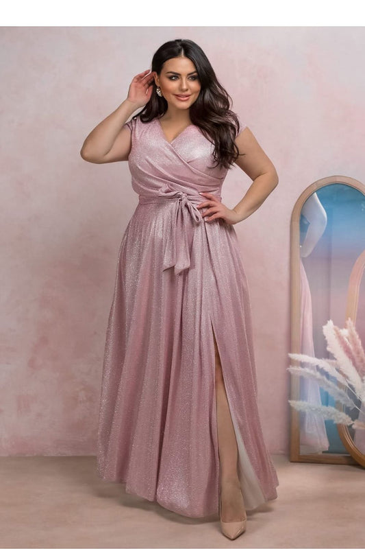 Elegant Plus Size Dress in Dirty Pink by With You, featuring a flattering V-neck, waist tie, and flared slit, designed for special occasions.