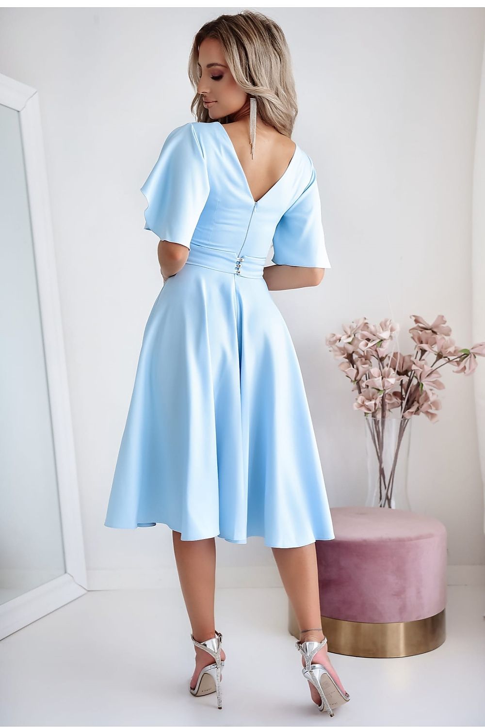 Luxurious blue cocktail dress with decorative belt and flared bottom by With You, ideal for weddings and elegant receptions.