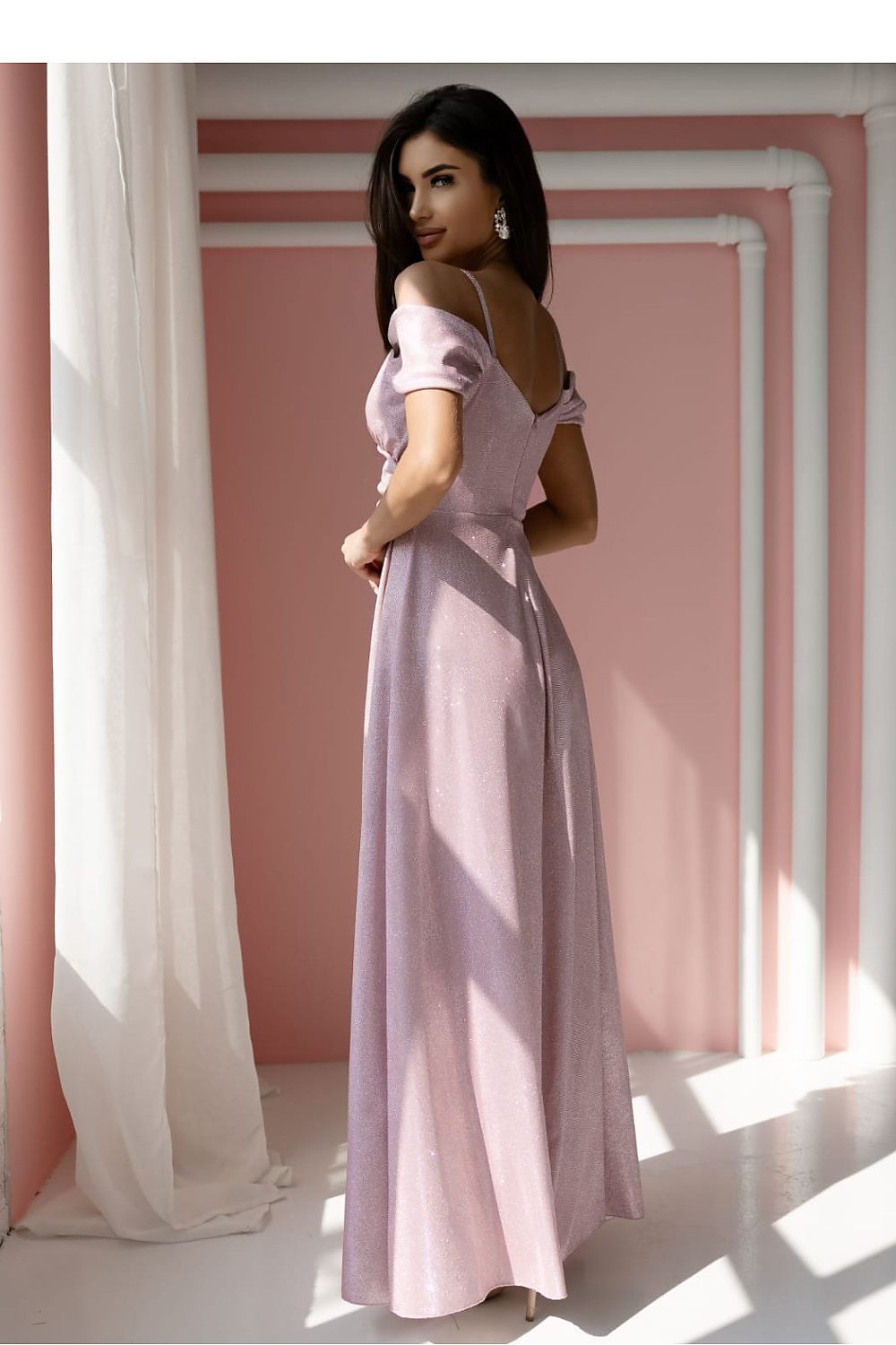 Chic long dress by With You, highlighted by a graceful silhouette with a stylish slit and wrapping neckline.
