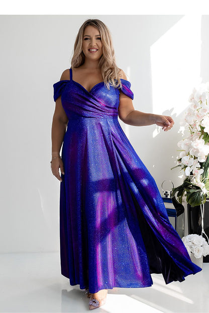 Beautiful long dress by With You, showcasing a stunning slit and flowing silhouette perfect for elegant occasions.