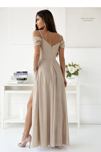 Model wearing the elegant long dress by With You, demonstrating its flattering fit and graceful silhouette.
