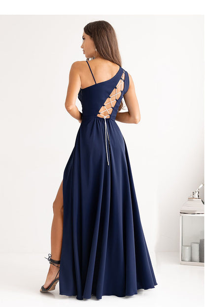 Elegant asymmetrical strap long flared dress with cutout back, designed by With You, showcasing a luxurious silhouette for sizes EU 32 to EU 46.