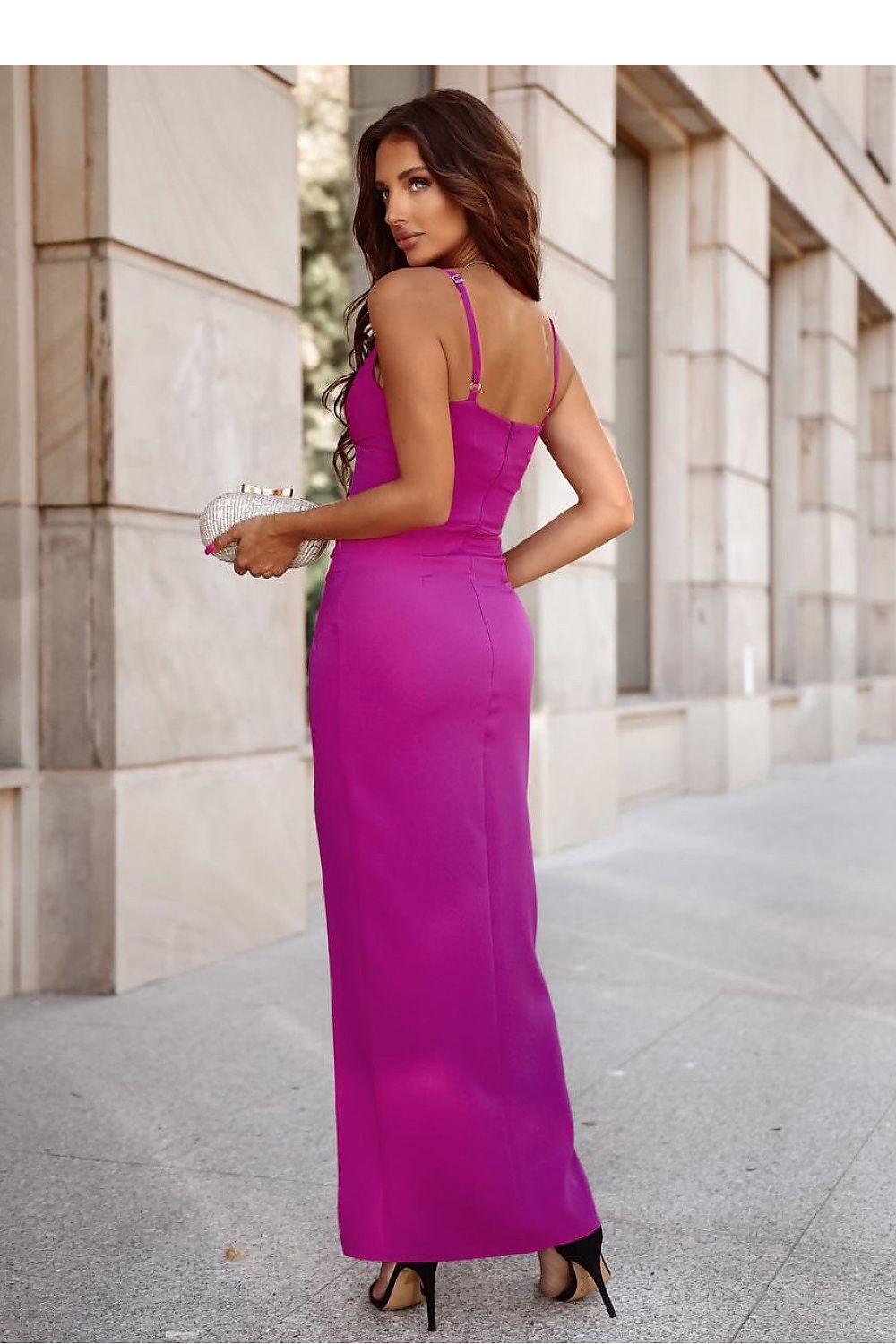 Stylish view of an adjustable strap long dress by With You, showcasing fitted silhouette.