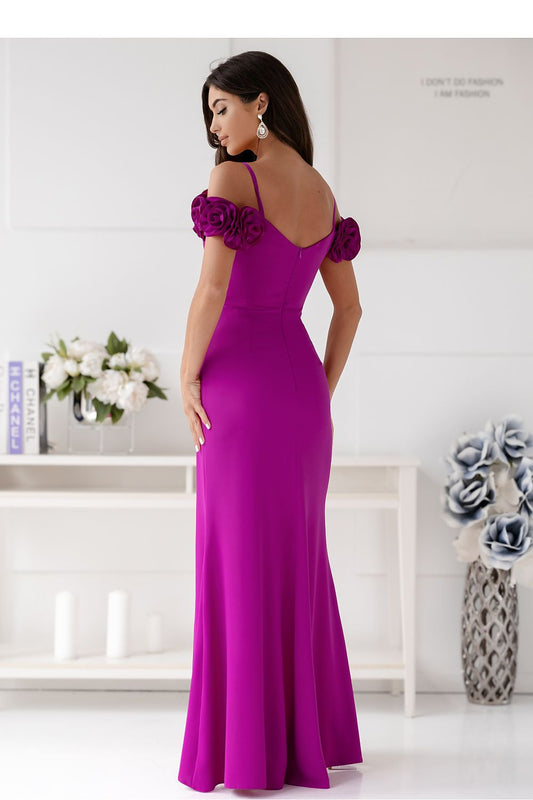 Elegant long dress with a deep wrap neckline and floral sleeve detail by With You, showcasing a stylish slit and flattering fit, available in sizes EU 34-40.