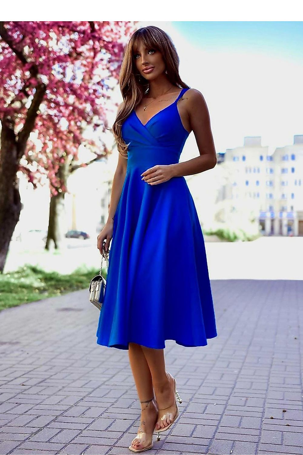 With You's sophisticated 7/8 length evening dress adorned with a flared slit, perfect for a luxurious evening look.