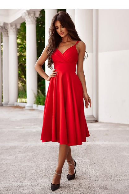 Model wearing the flared slit 7/8 length evening dress by With You, showcasing its sophisticated silhouette.