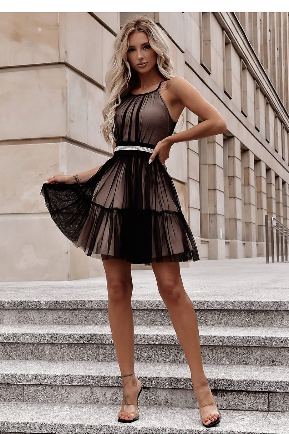 Close-up of the adjustable straps and tie waist detail on the With You elegant tulle evening dress.