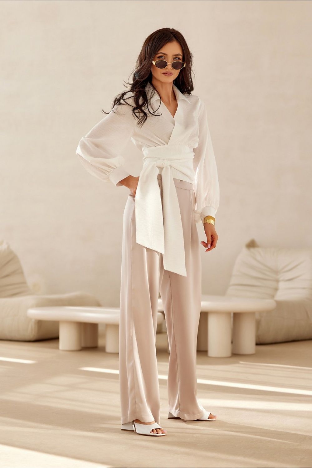 Luxury cropped blouse by Roco Fashion featuring a collar and tie waist with long puffy sleeves, perfect for elegant occasions.