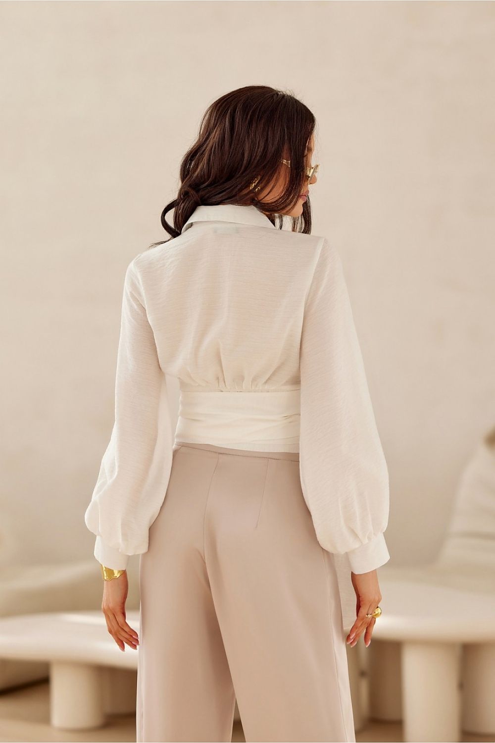 Close-up of Roco Fashion's luxury cropped blouse, showcasing the exquisite lapel neckline and soft fabric blend of nylon and viscose.