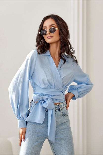 Detailed view of Roco Fashion's luxury cropped blouse with collar, emphasizing its quality construction and fashionable silhouette.