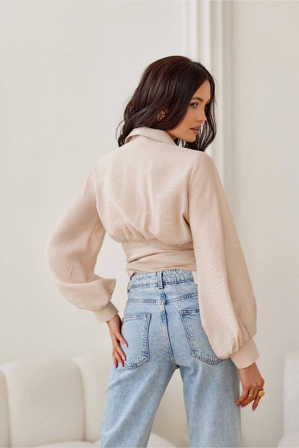 Side view of the luxury blouse by Roco Fashion, emphasizing the flattering cropped length and tie waist feature.