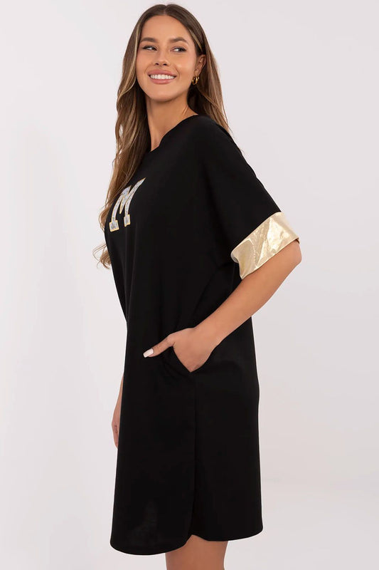 Stylish knee-length dress from Italy Moda with soft viscose blend fabric, showcasing elegant gold cuffed short sleeves and a contemporary design.