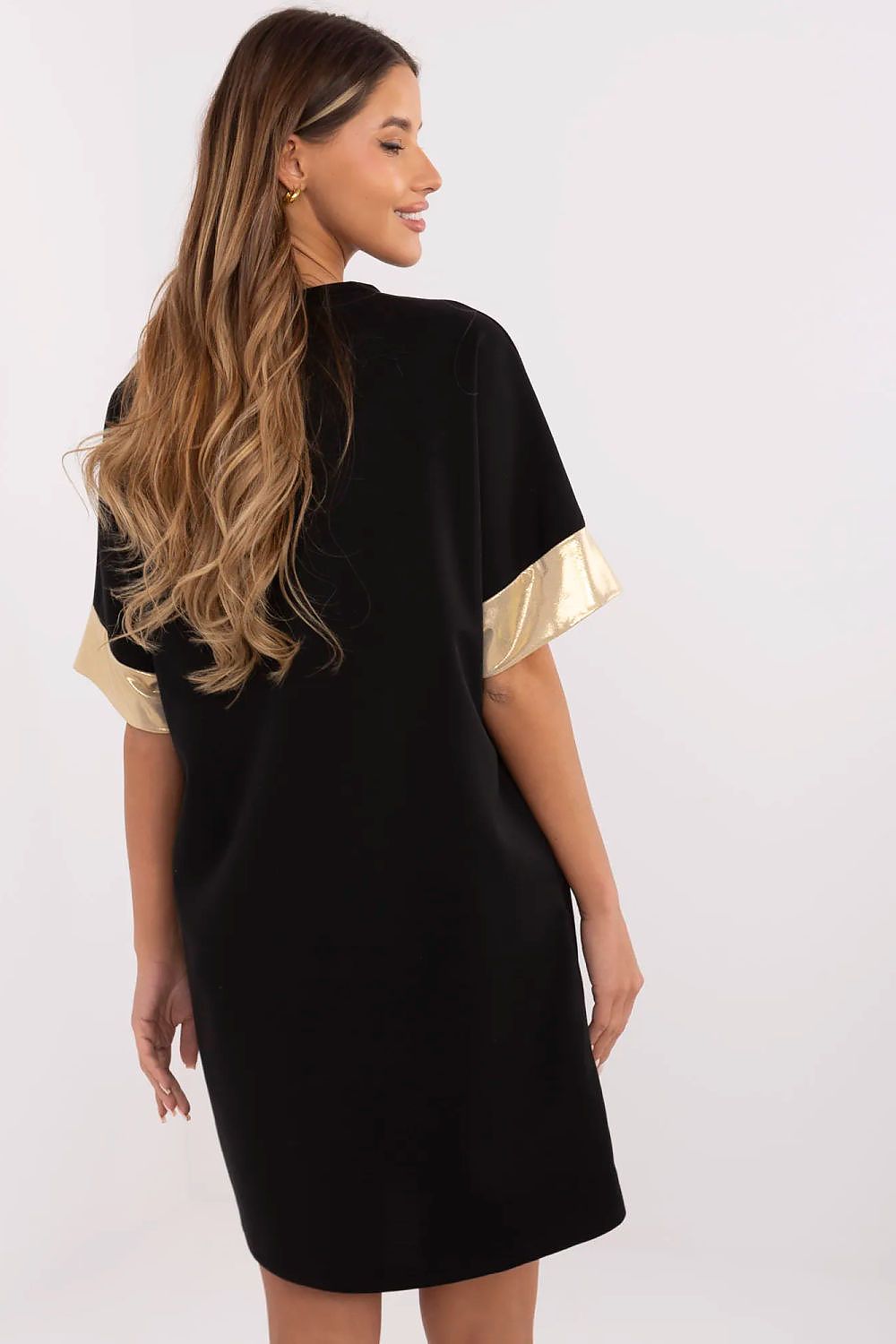 Italy Moda's luxurious oversized dress, made with a high-quality blend, adorned with unique front print and spacious side pockets for functionality.