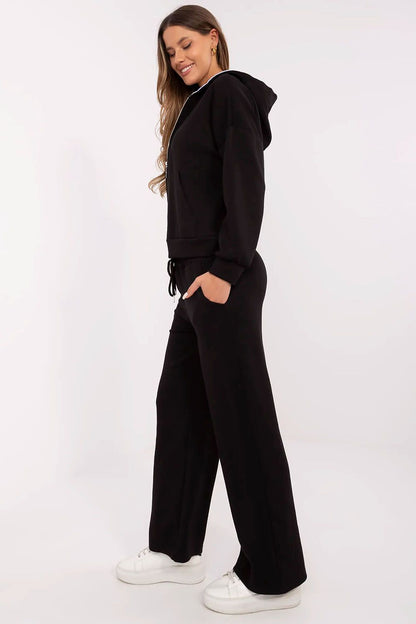 Stylish close-up of the Italy Moda women's tracksuit set, detailing the soft fabric blend of cotton, spandex, and viscose, perfect for everyday luxury wear.