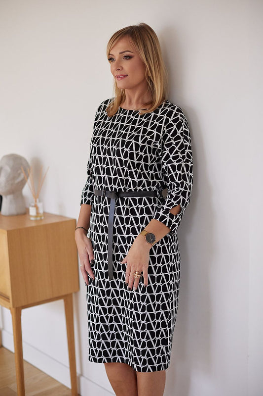 La Aurora Women's Kimono Daydress featuring an elegant jacquard knit design, perfect for curvy figures, showcased in a sophisticated setting.