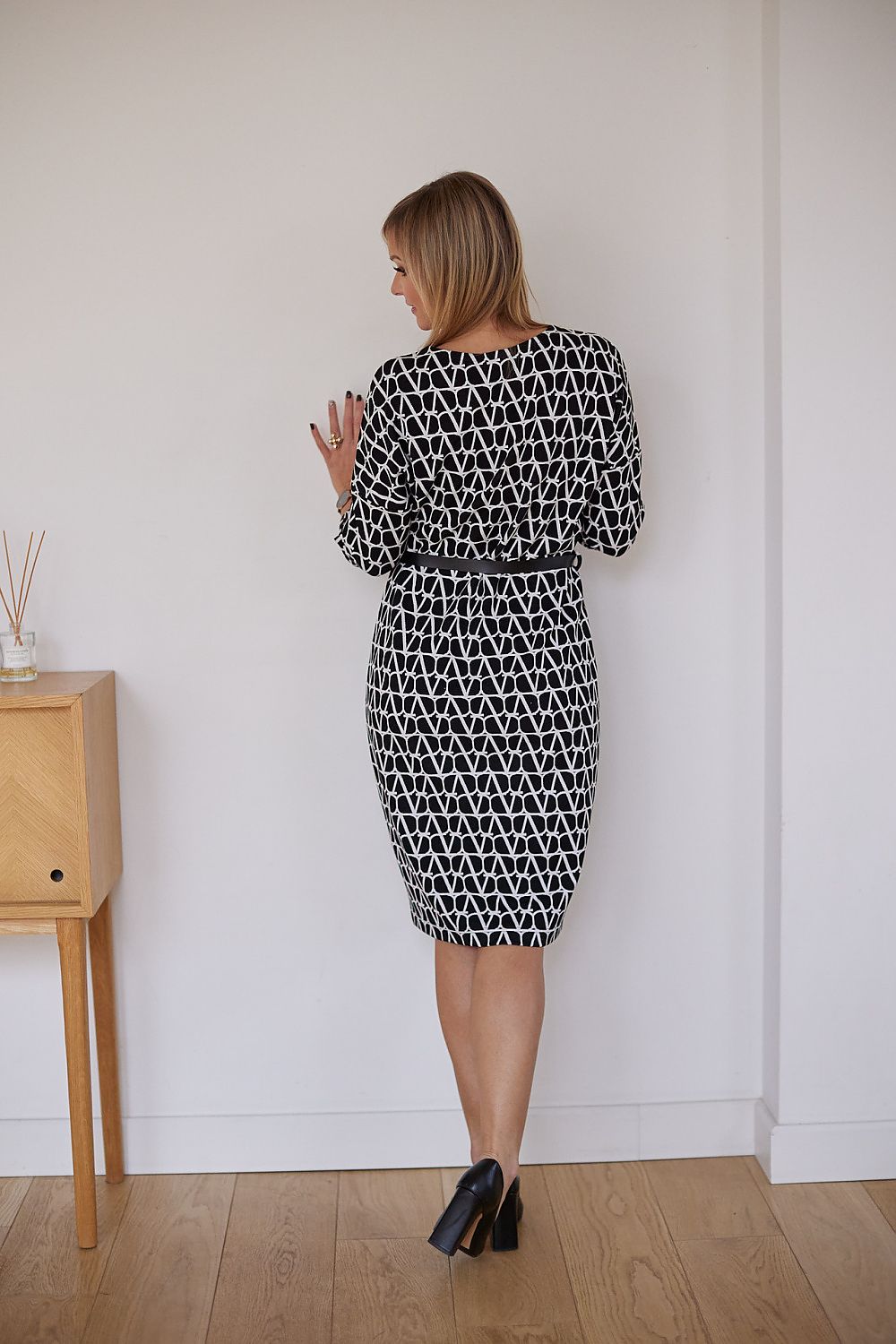 Model wearing La Aurora Women's Kimono Daydress, highlighting the draped sleeves and flattering silhouette, suitable for mature women.