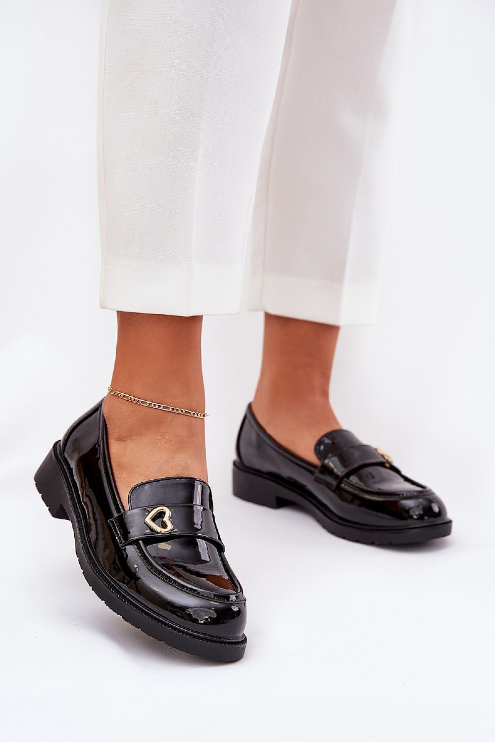 Elegant S.Barski synthetic leather moccasin loafers featuring a decorative heart detail, perfect for spring styling.