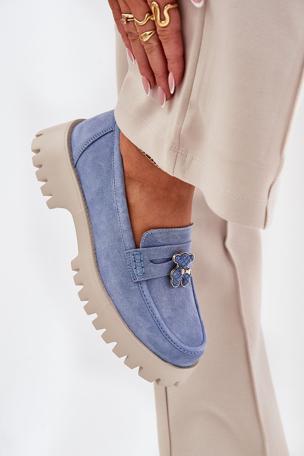 Elegant and stylish moccasins for women from Step in Style, made from natural suede with a unique teddy bear clasp, perfect for casual sophistication.