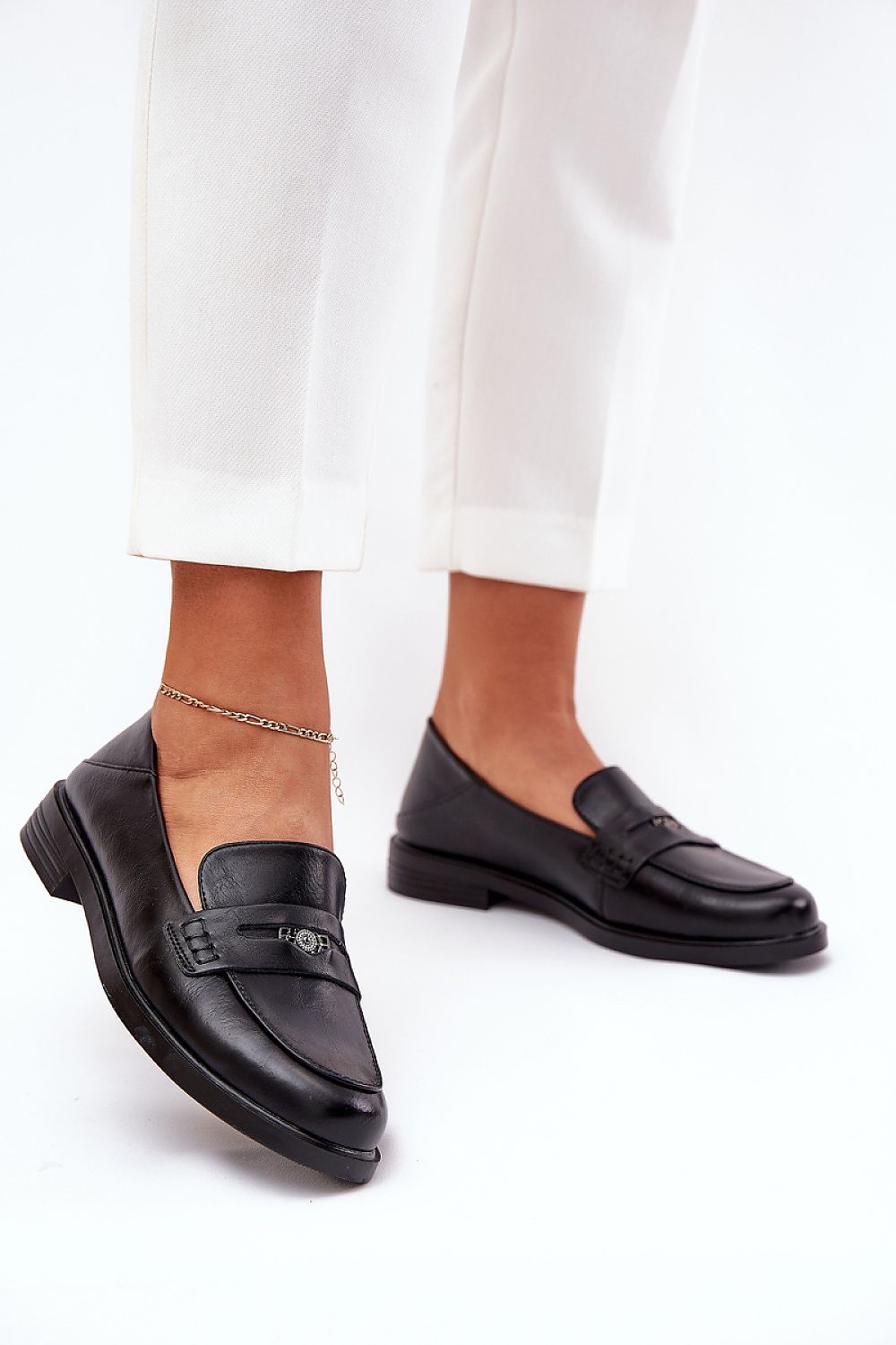 Elegant women's natural leather moccasin shoes by Step in Style, showcasing a refined design with a subtle decoration and flat heel, perfect for sophisticated comfort.