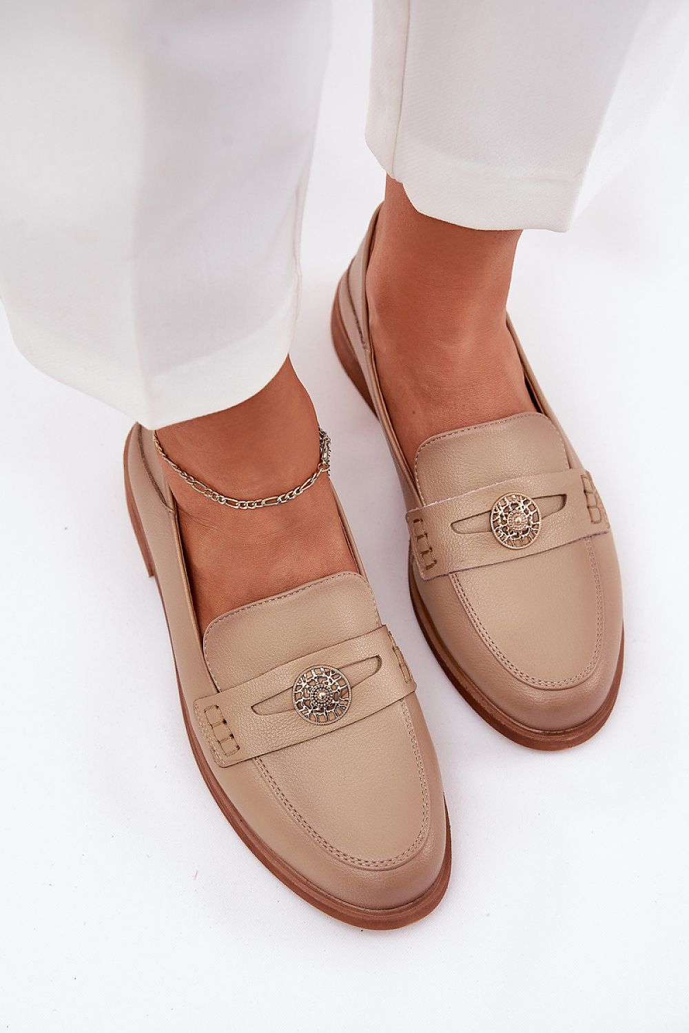 Elegant women's natural leather moccasin shoes by Step in Style, featuring a rounded toe and comfortable flat heel, perfect for stylish everyday wear.