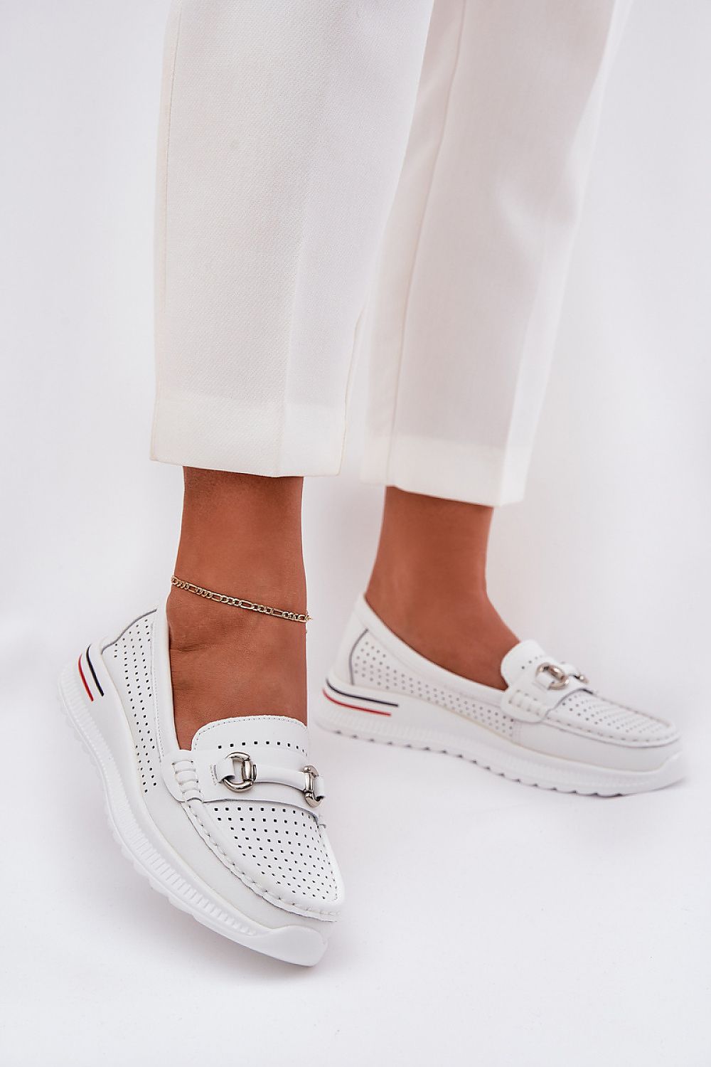 Sophisticated natural leather ballet flats from Step in Style, ideal for both casual walks and elegant occasions.