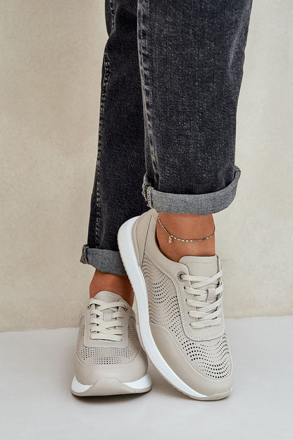Step in Style's elegant women's sports shoes crafted from natural leather, showcasing a stylish laced design and a comfortable insole for all-day wear.