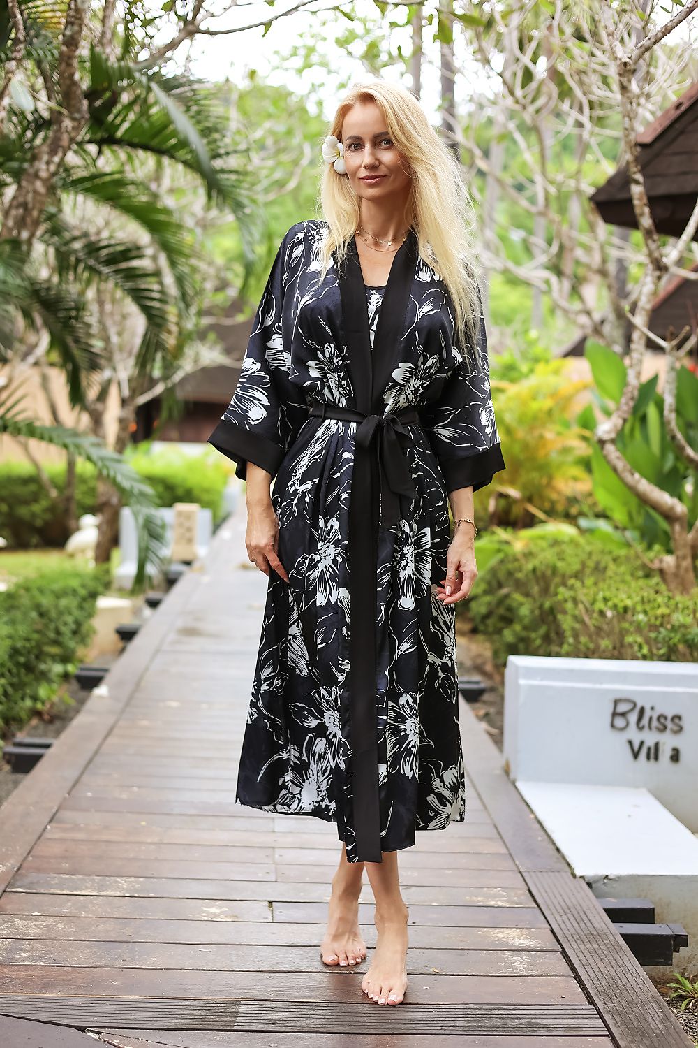 Kalimo satin bathrobe nightgown displayed in an opulent setting, exemplifying comfort and style, ideal for a sophisticated night in.