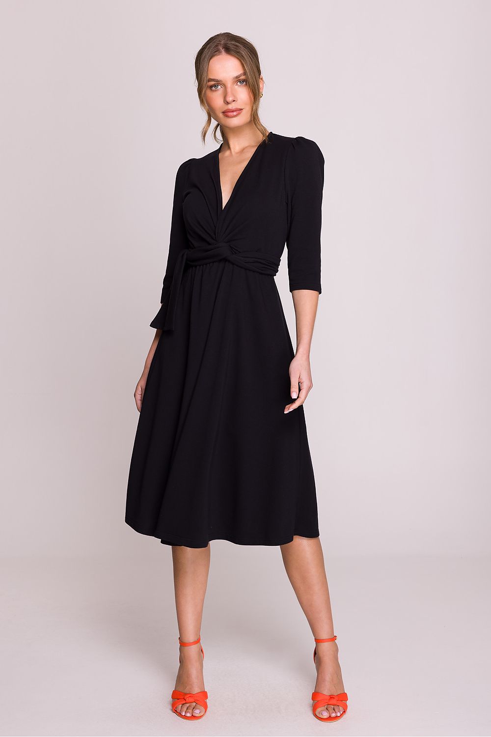 The back view of the Stylove Elegant V-Neck Modal Daydress, highlighting the graceful flow of the fabric and the comfort of 3/4 sleeves for a stylish appearance.