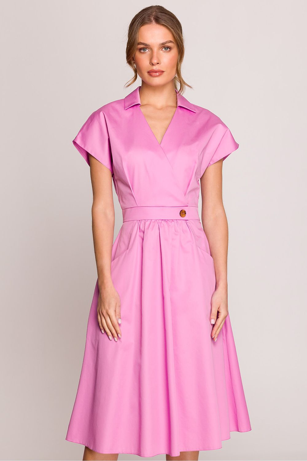 Model wearing the Stylove elegant shirt dress, highlighting its flattering silhouette and functional pockets, embodying timeless style.