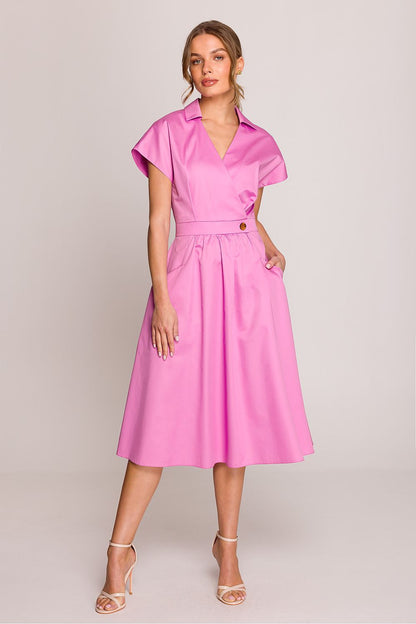 Stylove cotton shirt dress displayed elegantly on a hanger, featuring beautiful waist gathering and structured design, ideal for sophisticated occasions.