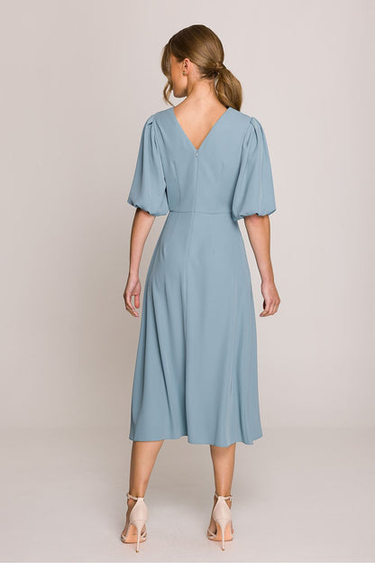 Elegant Stylove midi dress featuring a flared silhouette and luxurious puff sleeves, perfect for sophisticated everyday wear.