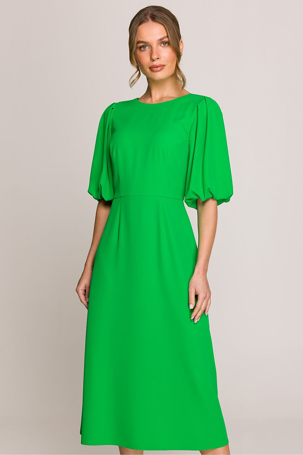 Close-up of Stylove's romantic midi dress showcasing its beautiful round neckline and delicate lined puff sleeves.