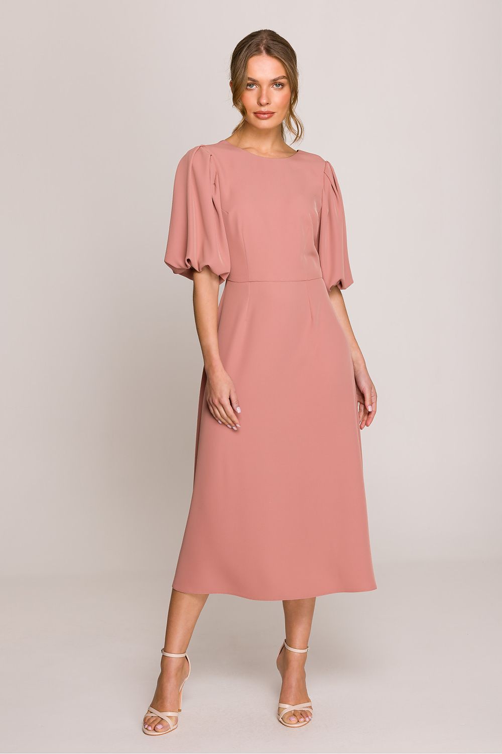 Stylove midi dress captured in soft lighting, emphasizing the luxurious fabric blend of 95% polyester and 5% spandex for ultimate comfort.
