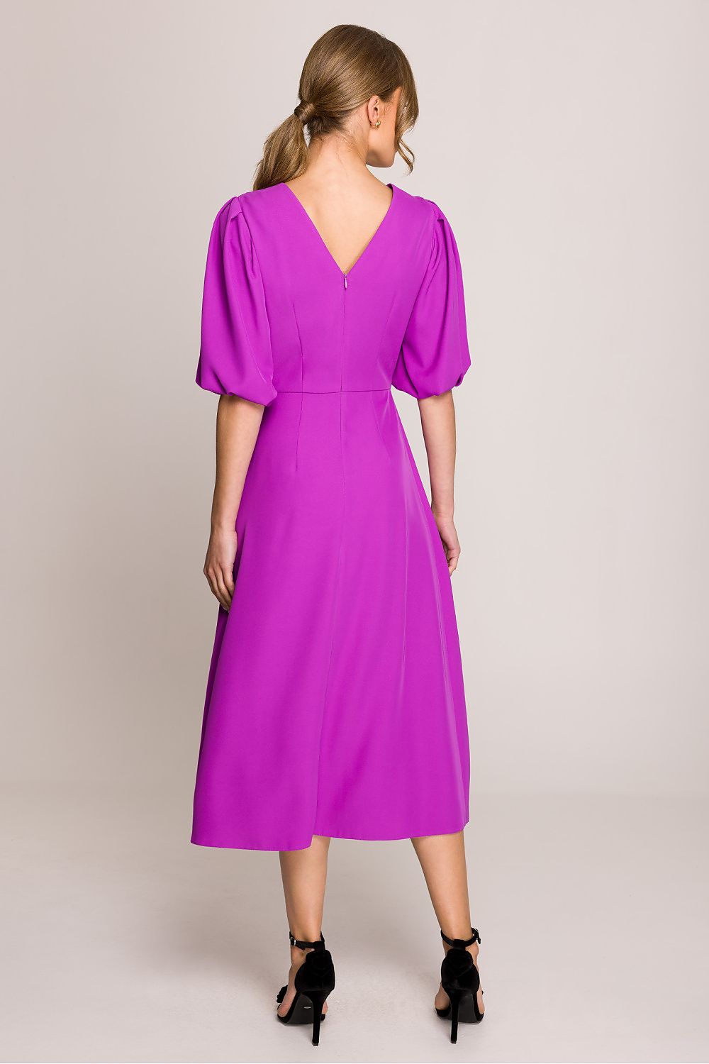 Elegant Stylove midi dress featuring a flared silhouette and puff sleeves, perfect for stylish everyday wear.