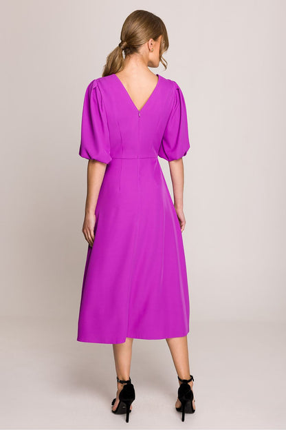 Elegant Stylove midi dress featuring a flared silhouette and puff sleeves, perfect for stylish everyday wear.