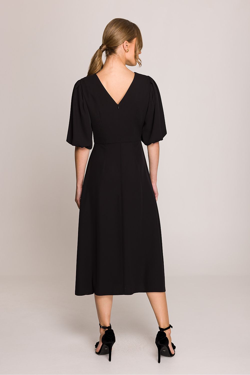 Stylove elegant midi dress featuring a flared silhouette and puff sleeves, perfect for everyday wear or special occasions. Designed with a round neckline and subtle V-shaped back, this romantic dress showcases feminine style and comfort. Available in sizes S-XL.