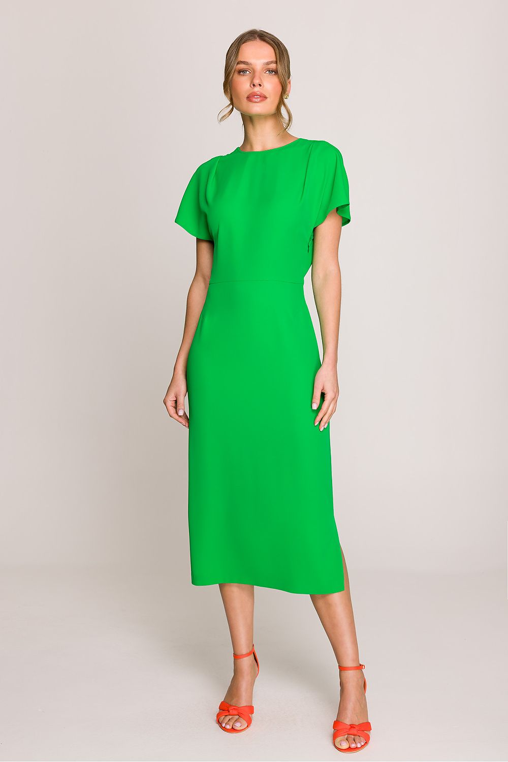 Chic Stylove midi dress on model, highlighting the elegant fit and sophisticated design suitable for receptions.