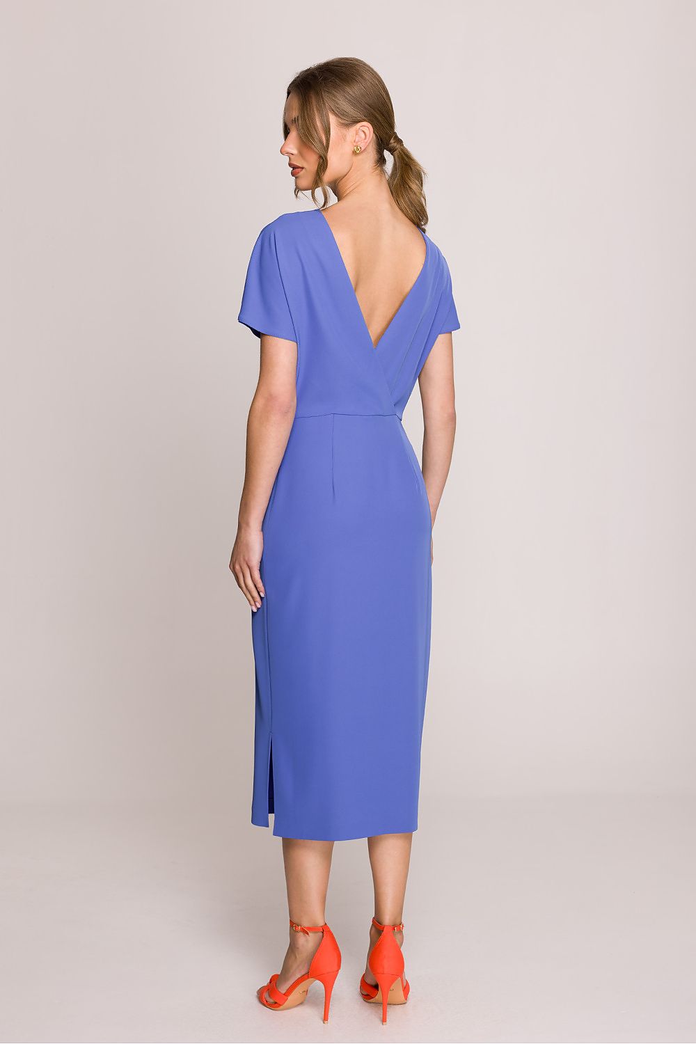 Elegant Stylove Midi Dress side view displaying fit and side slit for graceful movement.