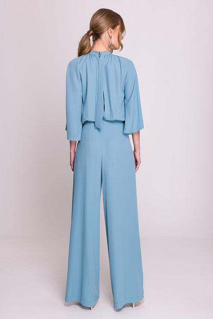 Close-up of Stylove jumpsuit detailing, highlighting the delicate ruching and stand-up collar, ideal for a refined look.