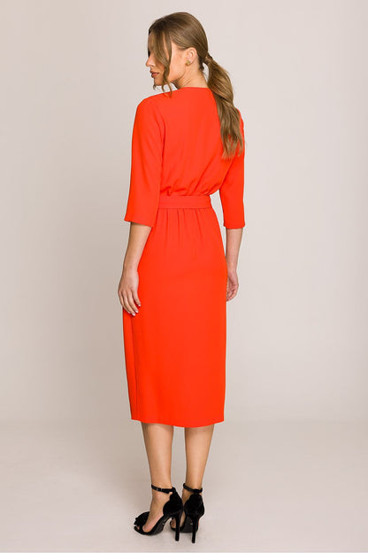 Stylove midi dress in elegant styling, featuring classic 3/4 length sleeves and soft wrap motif suitable for formal events.