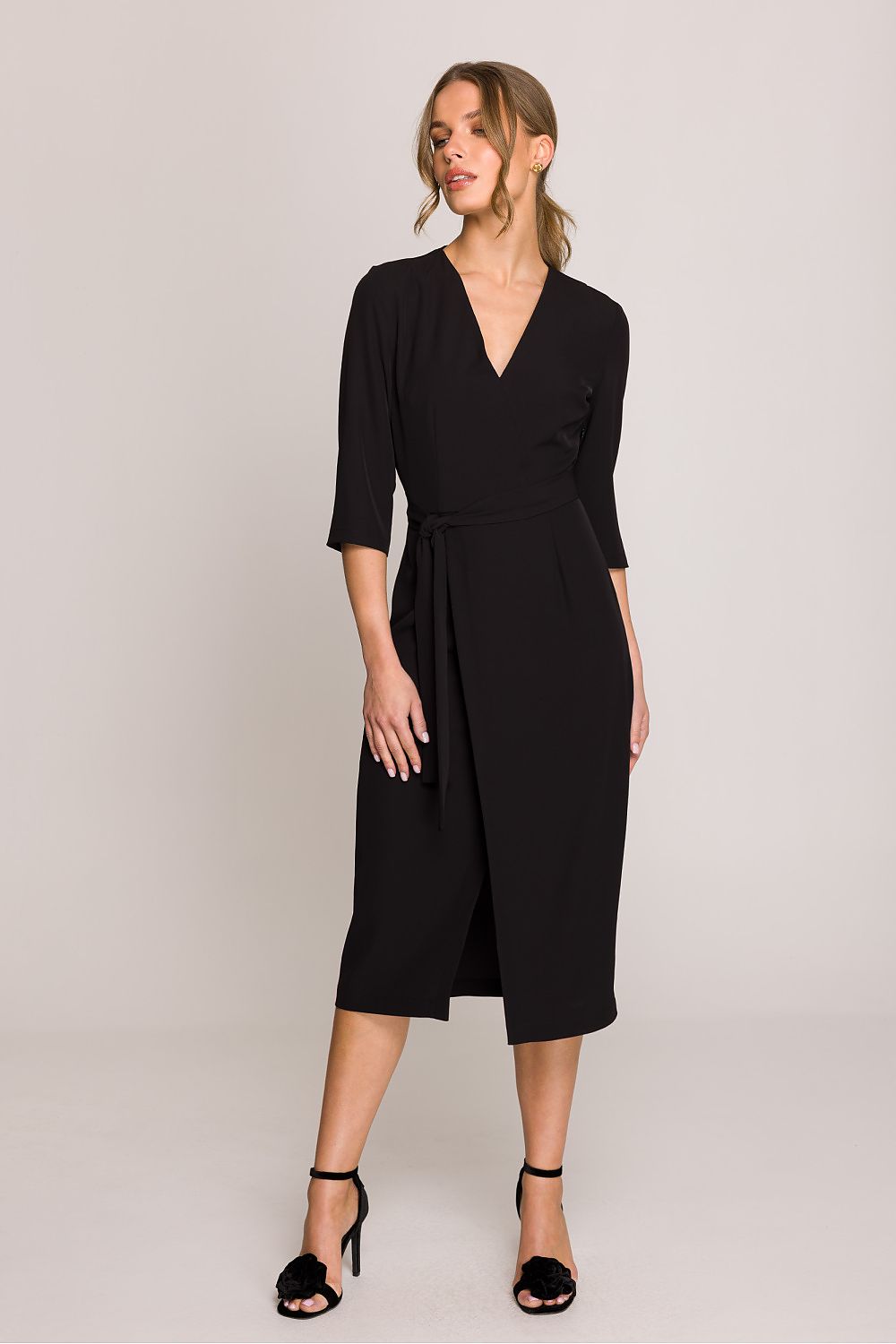 Stylove sophisticated midi dress highlighting the waist with a tied belt, designed for flattering curves at special occasions.