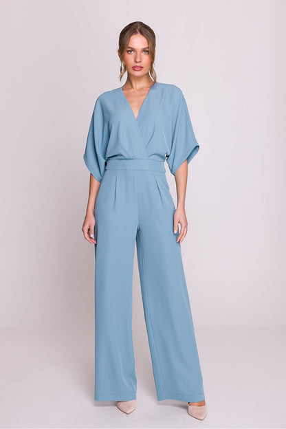 Elegant women's jumpsuit by Stylove featuring a luxurious wrap top, V-neckline, and side pockets, available in sizes S to XXL.