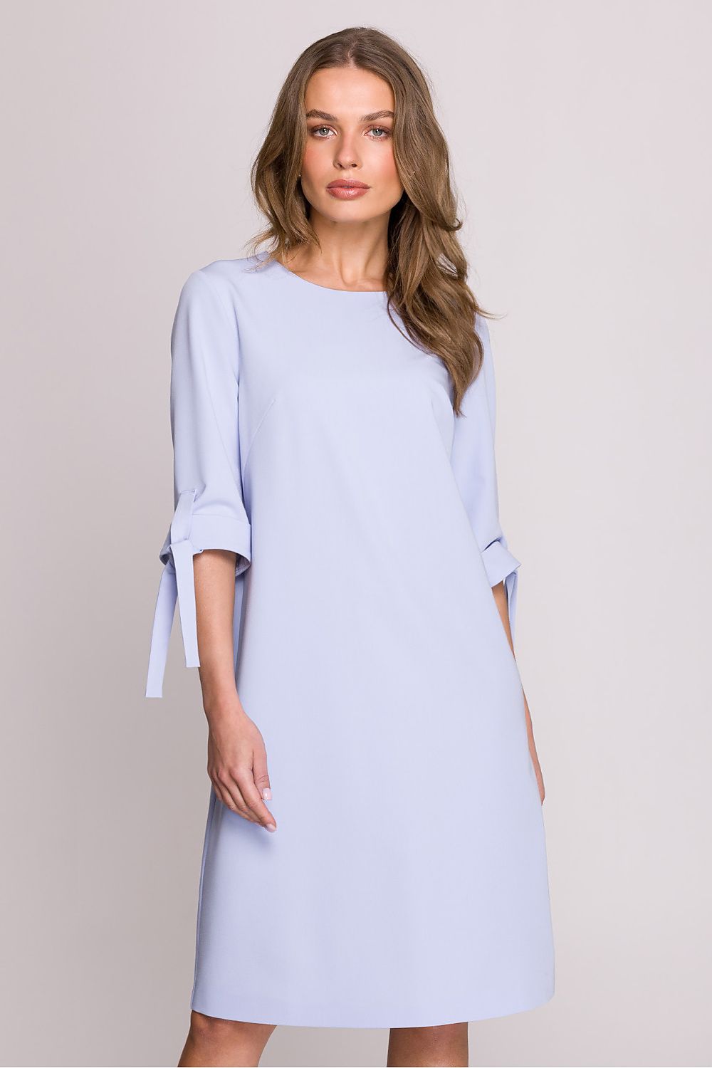 Elegant A-Line Daydress by Stylove showcasing its luxurious 3/4 sleeves and round neckline against a sophisticated background.