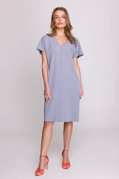 Close-up of Stylove knee-length V-neck dress detailing, highlighting its feminine silhouette and refined craftsmanship.