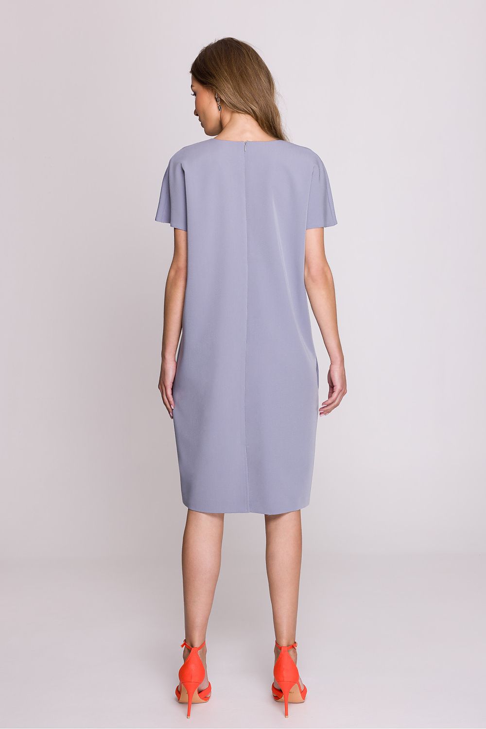 Stylove women's V-neck daydress displayed on a model, demonstrating elegant styling suitability for casual occasions.