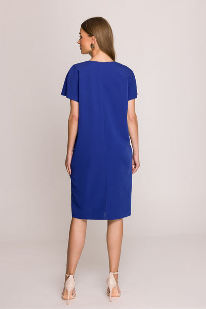 Stylove knee-length dress displayed on mannequin, highlighting its breathable fabric and stylish cut.