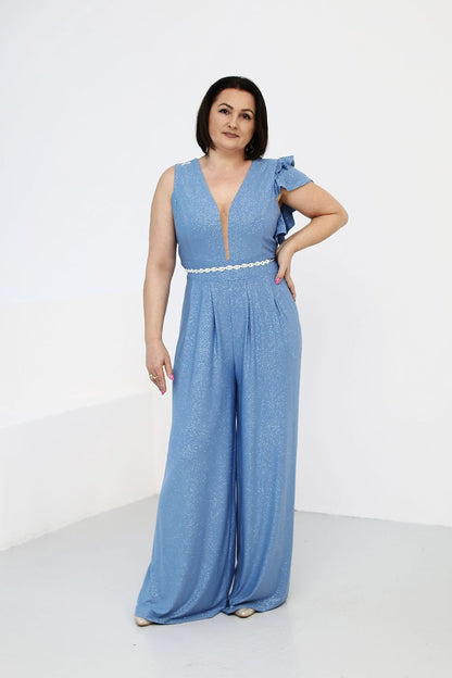 Luxurious women's jumpsuit by Jersa, featuring elegant frill detail, a cinched waist, and flowing pants, available in EU sizes 34-46.
