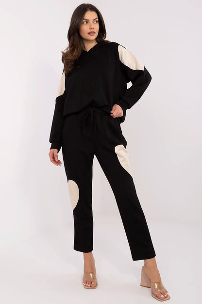 Italy Moda Women's Luxury Tracksuit Set featuring a soft cotton blend hoodie and high-waisted pants, elegantly styled for comfort and everyday wear. Ideal for casual outings and relaxation.